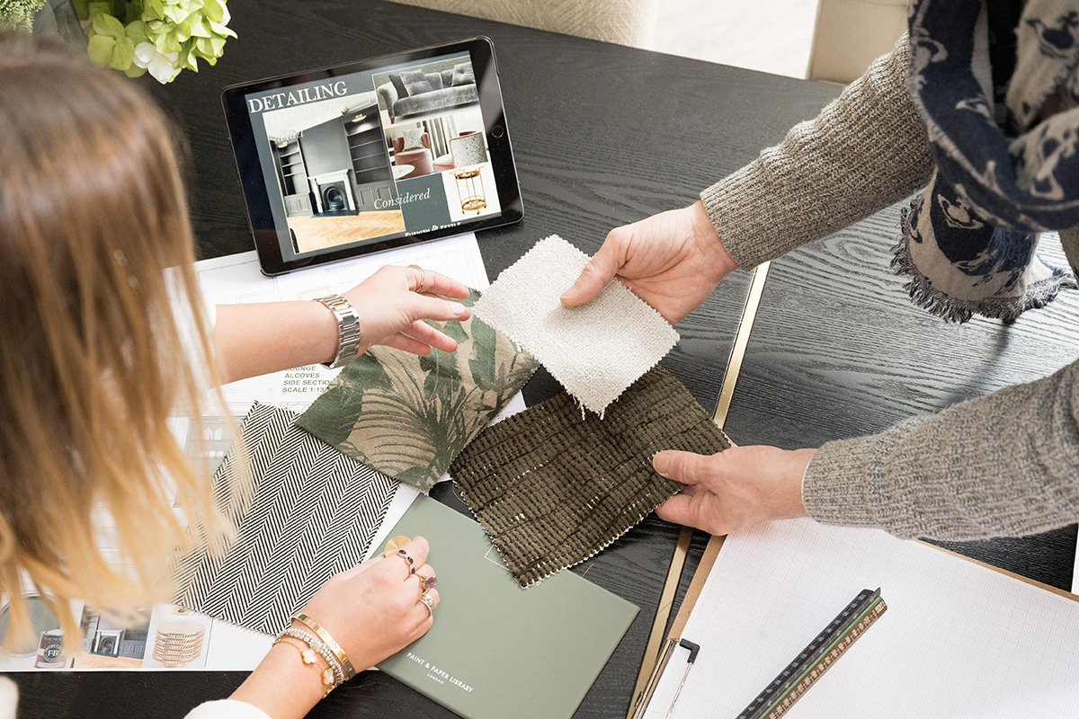 Interior designers discussing details