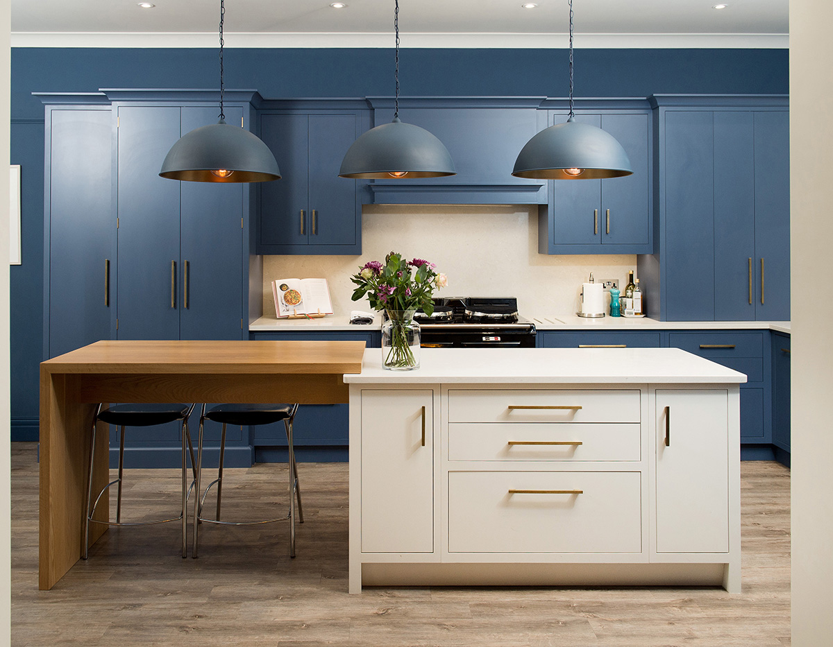 Contrasting blue and off white kitchen design