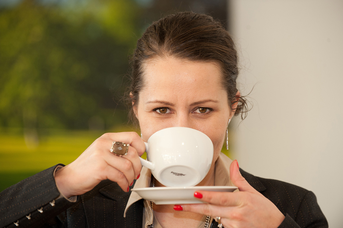 Head shot drinking coffee
