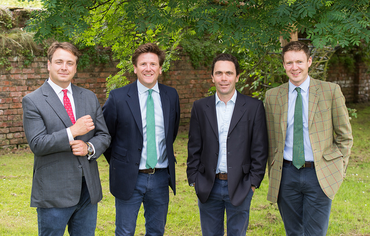 Group of four collegues outside