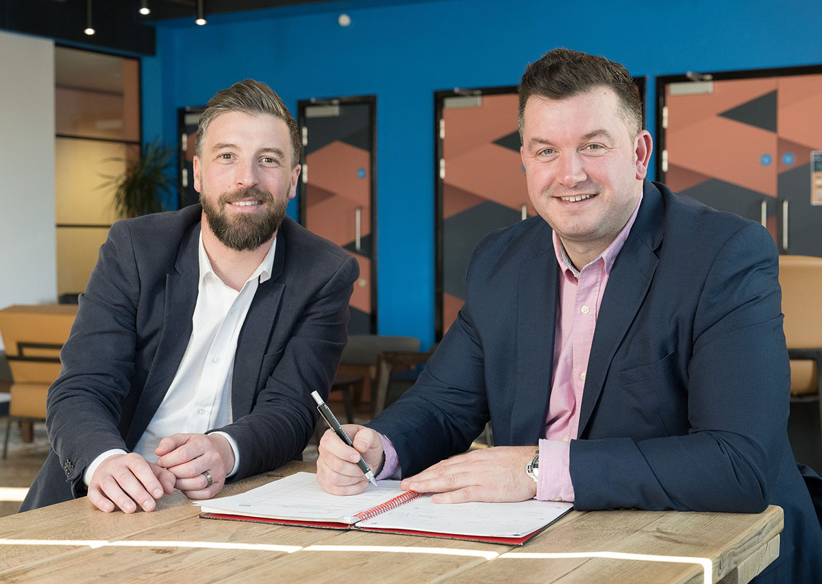 Two collegues with a document