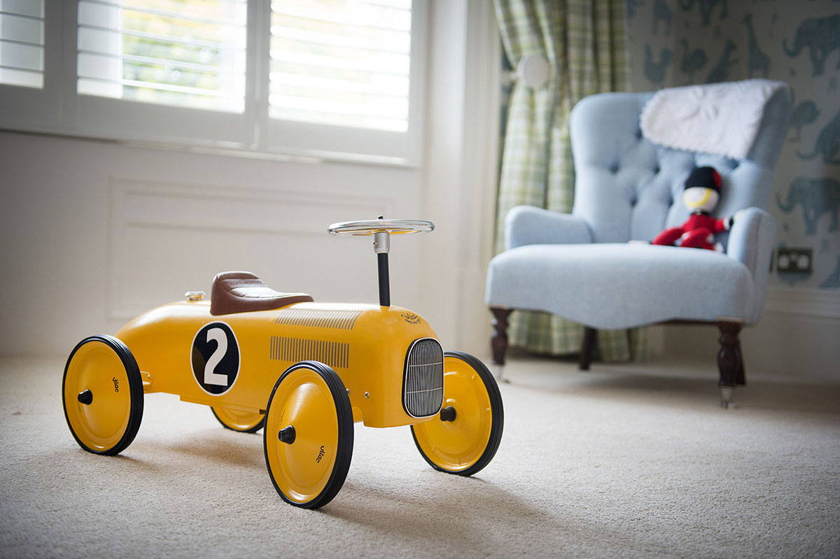 Childrens bedroom cameo of a ride-on toy car