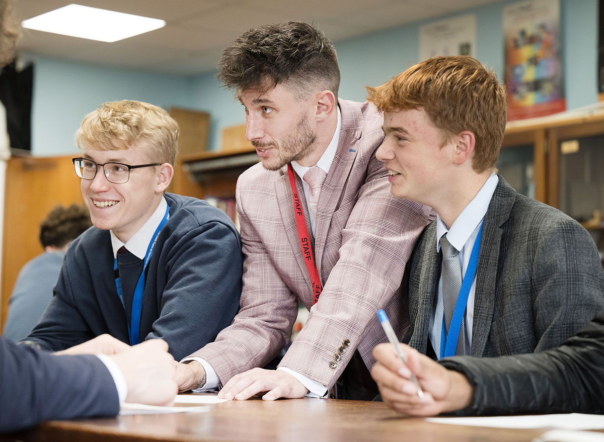 Teacher engaging students in biology lesson